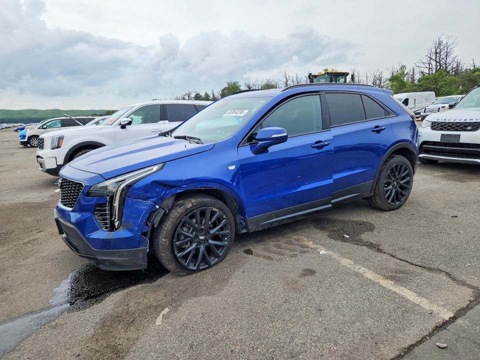 CADILLAC XT4 2022 с VIN 1GYFZER45NF111239 - Фото с аукциона