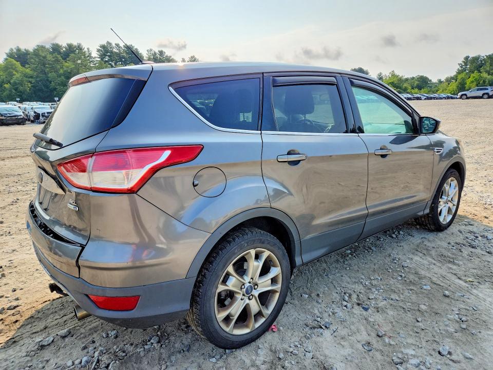 Photo 3 from auction – 2013 FORD ESCAPE with VIN 1FMCU9H96DUC90294