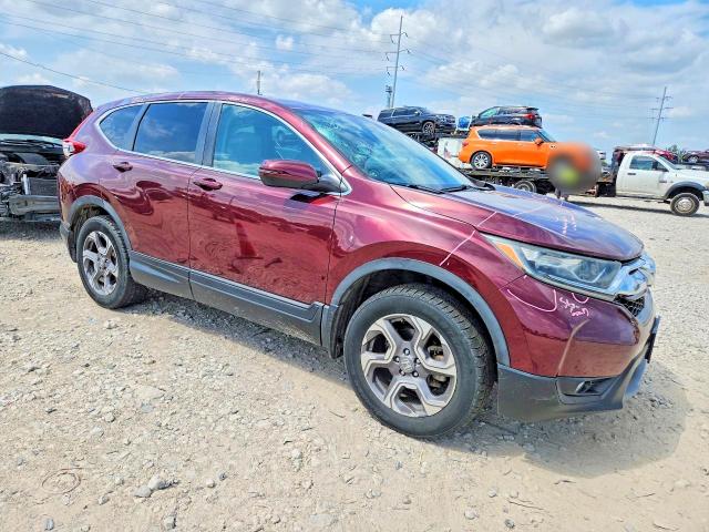 Photo 4 from auction – 2019 HONDA CR-V with VIN 7FARW2H59KE010925