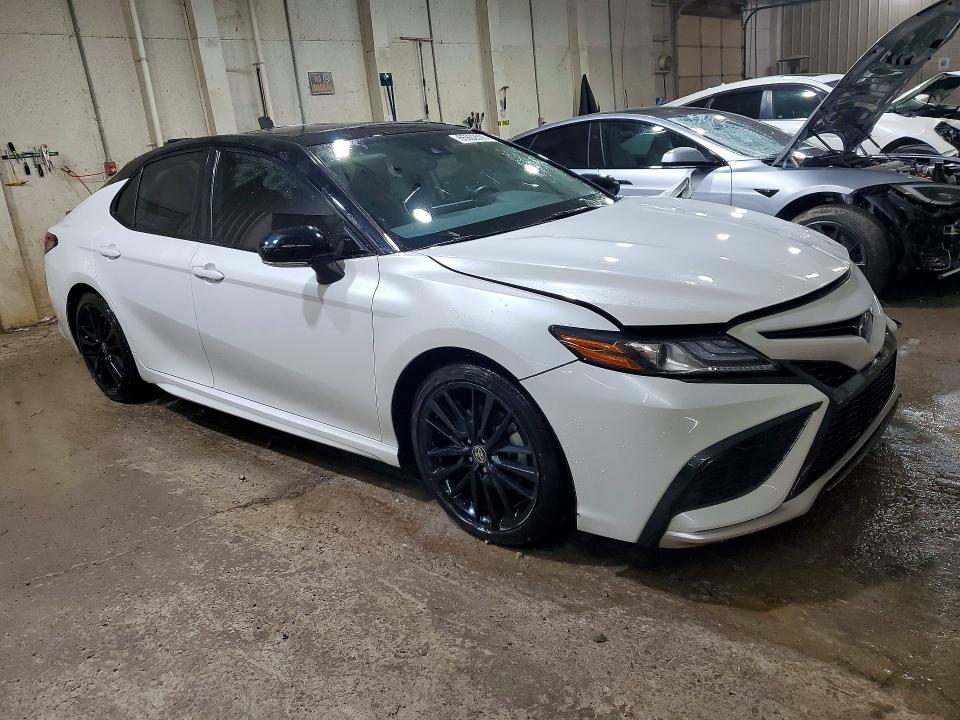 Photo 4 from auction – 2023 TOYOTA CAMRY with VIN 4T1K31AK6PU049529
