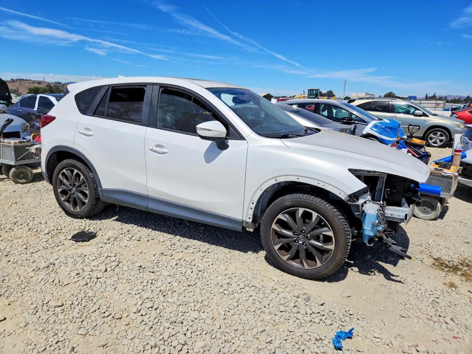 Foto 4 de la subasta – 2016 MAZDA CX-5 con VIN JM3KE4DYXG0675941