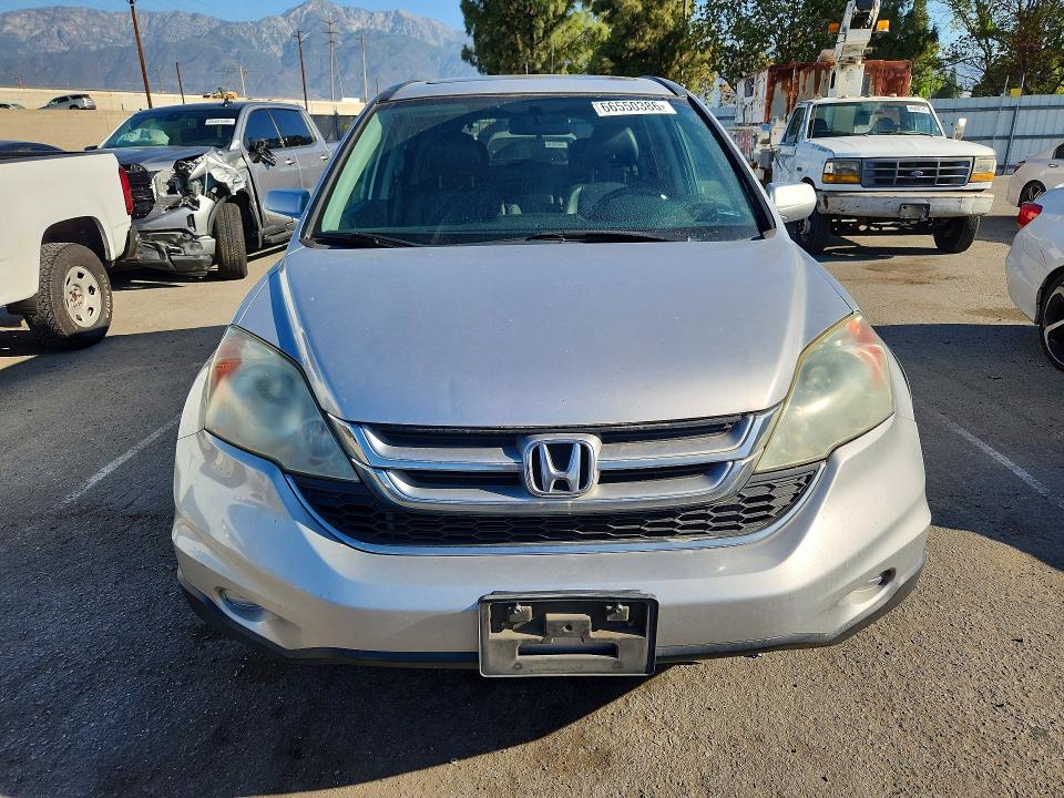 Photo 5 from auction – 2011 HONDA CR-V with VIN 5J6RE3H77BL054001