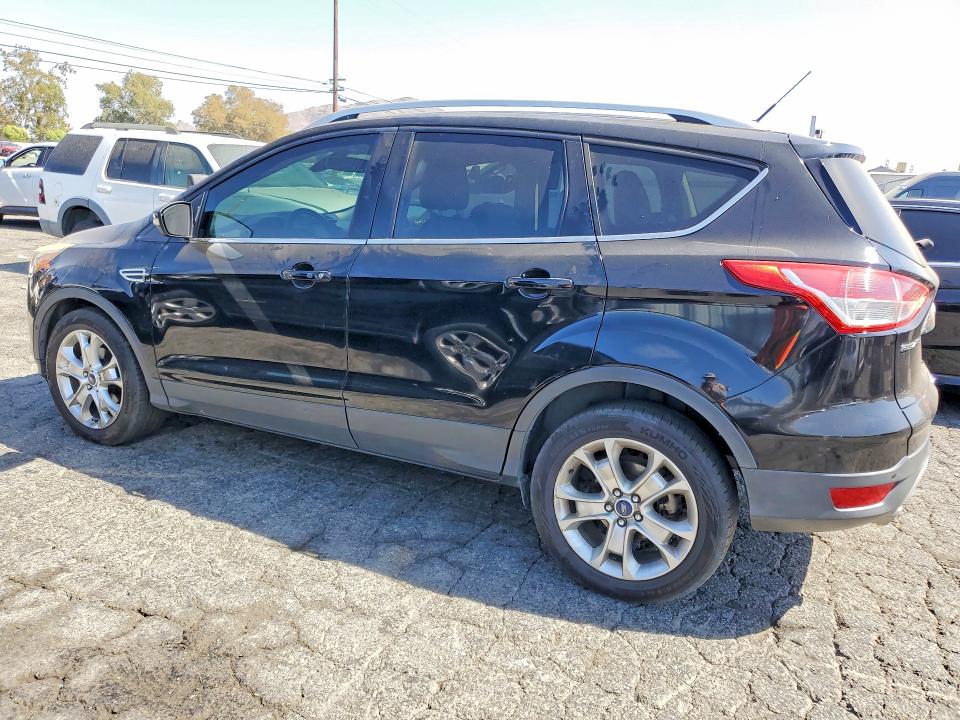 Photo 2 from auction – 2016 FORD ESCAPE with VIN 1FMCU0JX0GUC43917