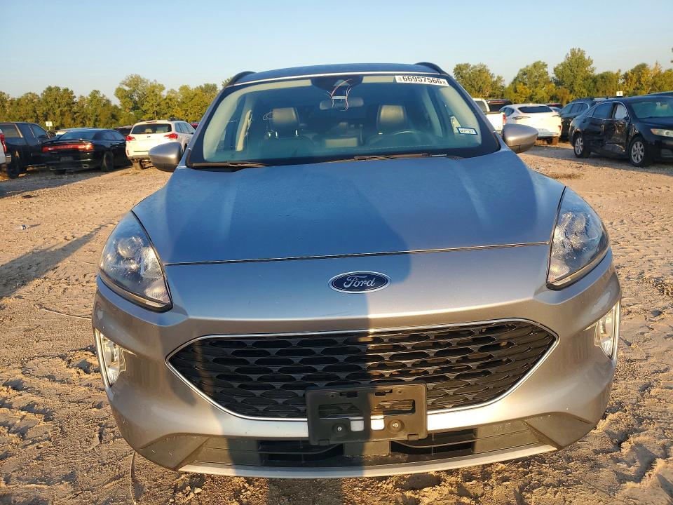 Photo 5 from auction – 2021 FORD ESCAPE with VIN 1FMCU9H67MUA64500