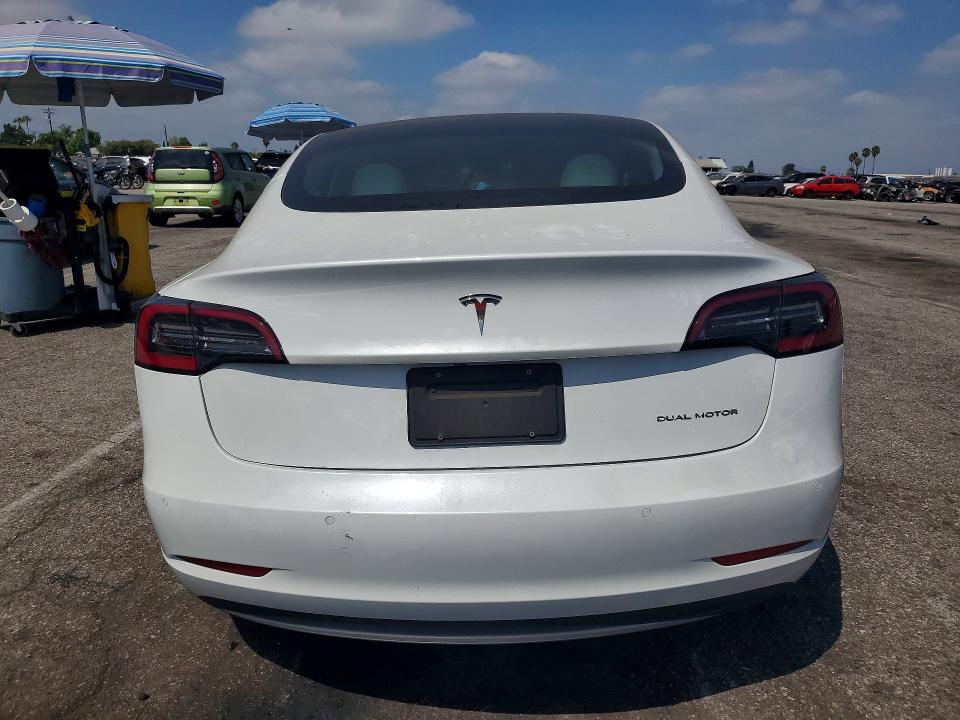 Photo 6 from auction – 2022 TESLA MODEL 3 with VIN 5YJ3E1EB7NF265344
