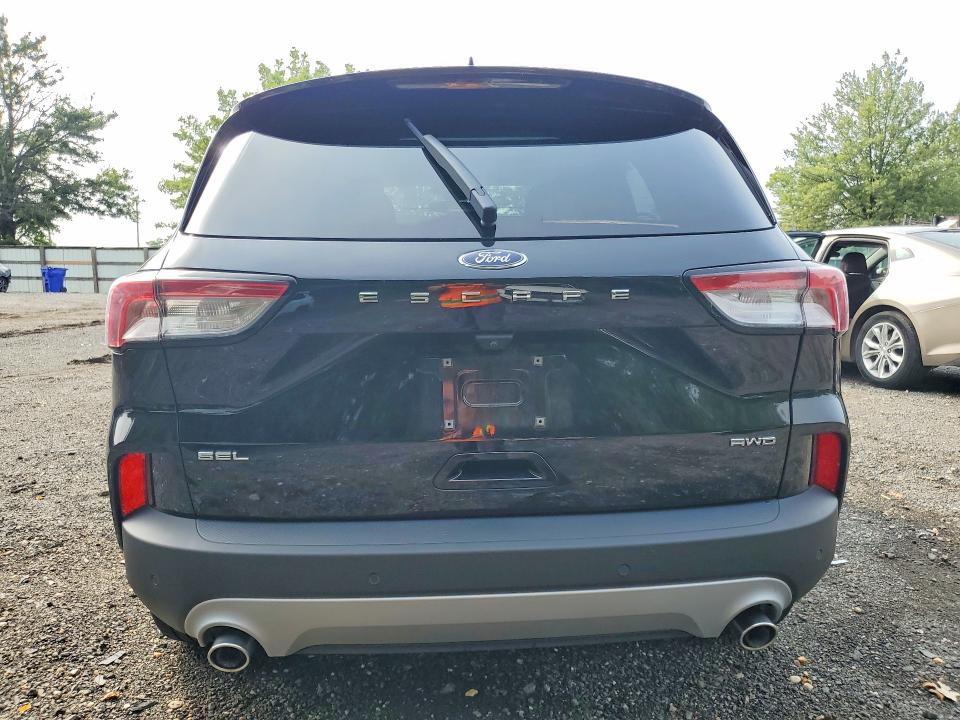 Photo 6 from auction – 2021 FORD ESCAPE with VIN 1FMCU9H63MUA65840