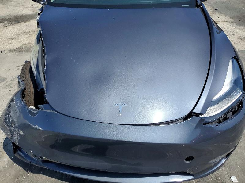 Photo 11 from auction – 2023 TESLA MODEL Y with VIN 7SAYGDEE6PF889931