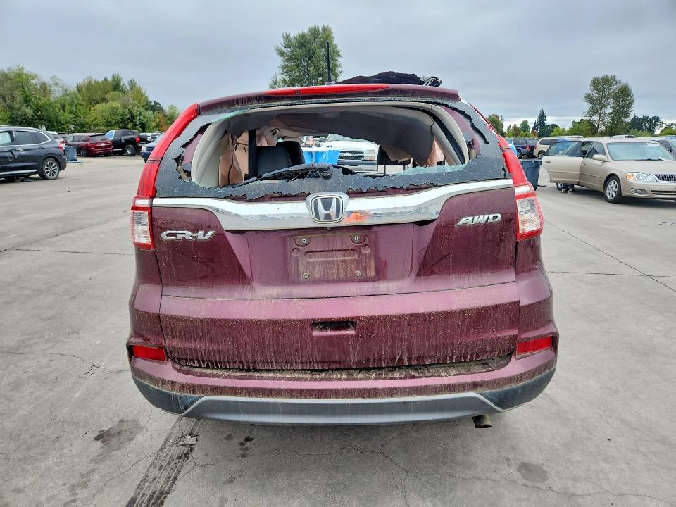 Photo 6 from auction – 2015 HONDA CR-V with VIN 2HKRM4H38FH642818