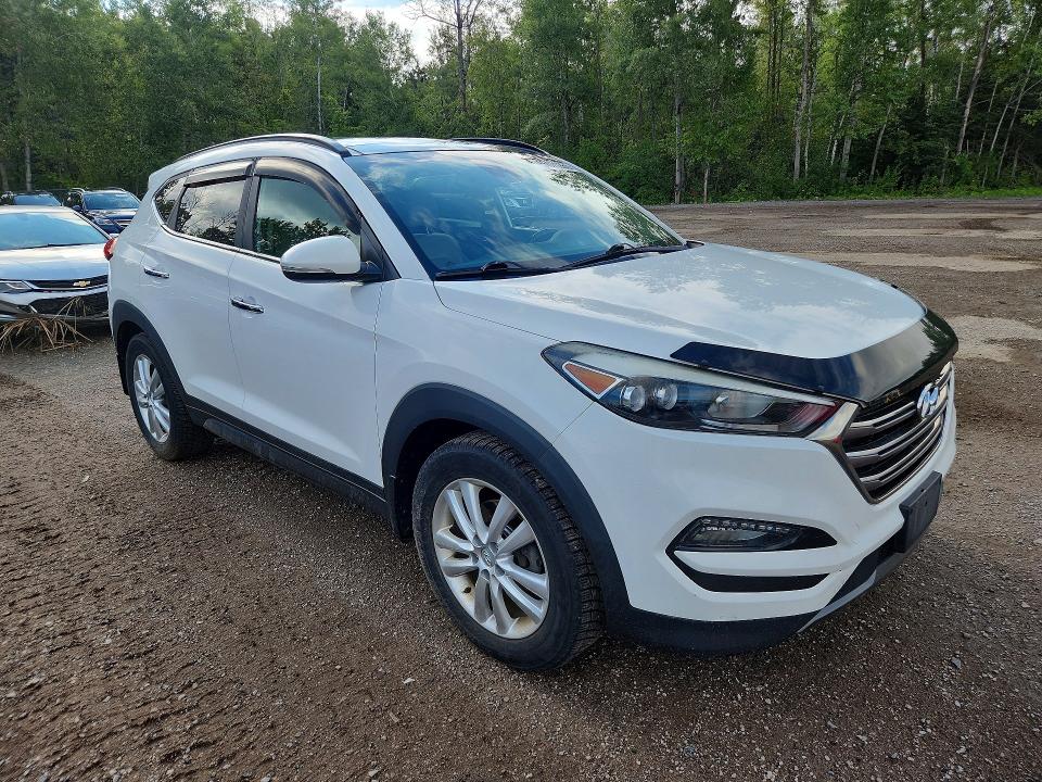 Photo 4 from auction – 2016 HYUNDAI TUCSON with VIN KM8J3CA21GU036761