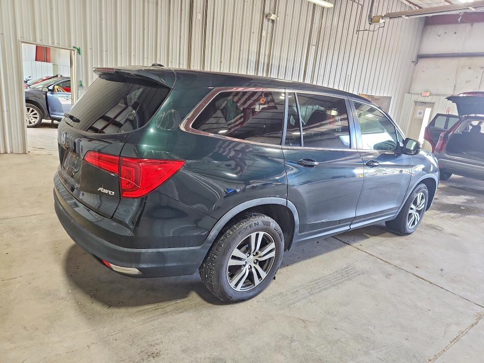 Photo 3 from auction – 2016 HONDA PILOT with VIN 5FNYF6H51GB004946