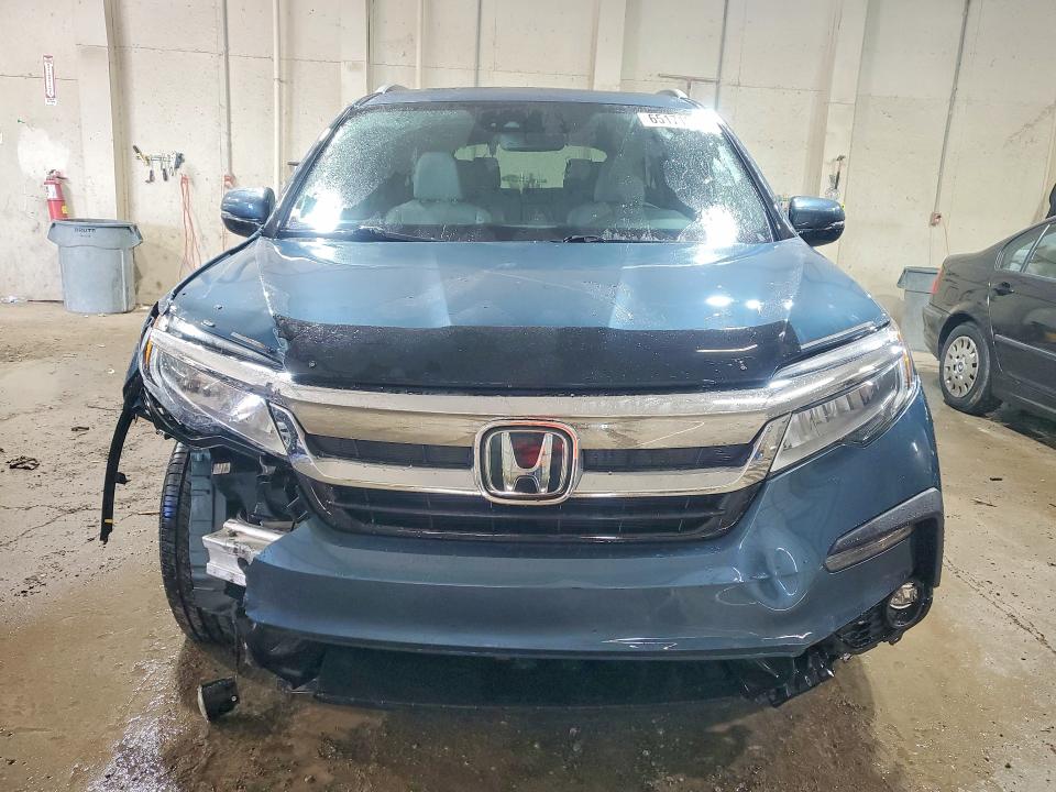 Photo 5 from auction – 2022 HONDA PILOT with VIN 5FNYF6H01NB003670