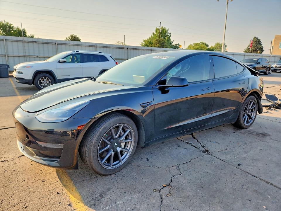 TESLA MODEL 3 2022 with VIN 5YJ3E1EA9NF186734 - Photo from auction