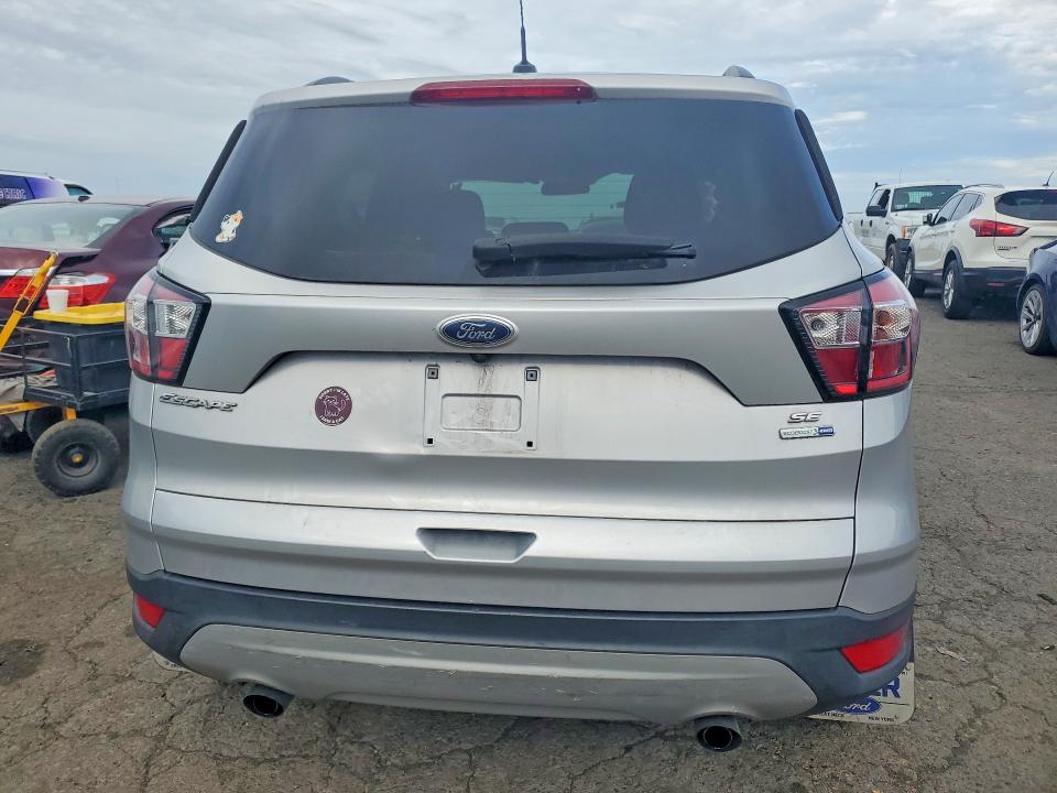 Photo 6 from auction – 2018 FORD ESCAPE with VIN 1FMCU9GD3JUD40229