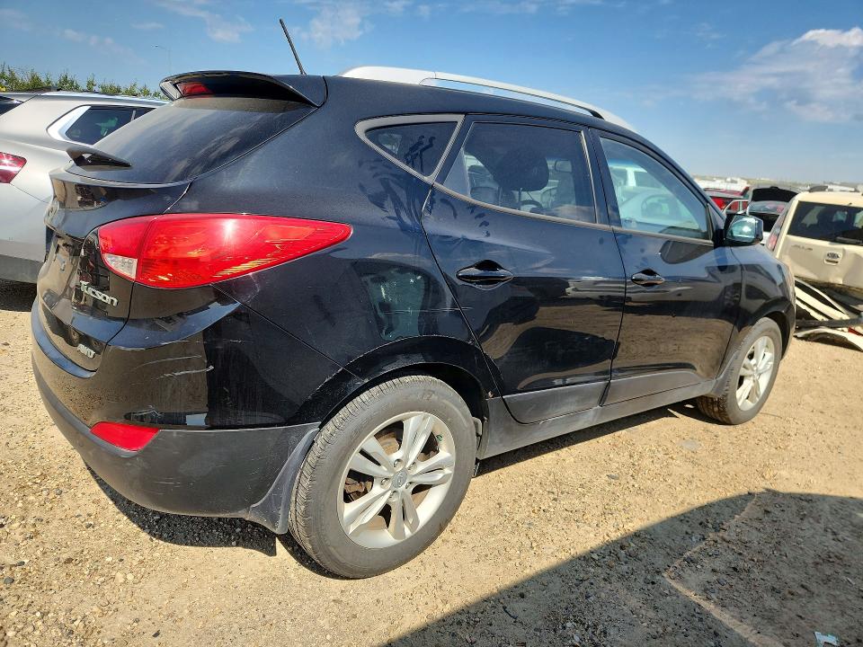 Photo 3 from auction – 2011 HYUNDAI TUCSON with VIN KM8JUCAC0BU178713