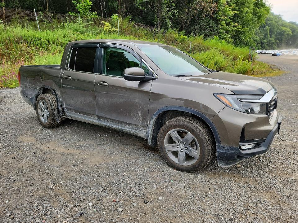 Снимка 4 от търг – 2023 HONDA RIDGELINE с VIN 5FPYK3F59PB009719