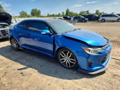Photo 4 from auction – 2014 SCION TC with VIN JTKJF5C7XE3068961