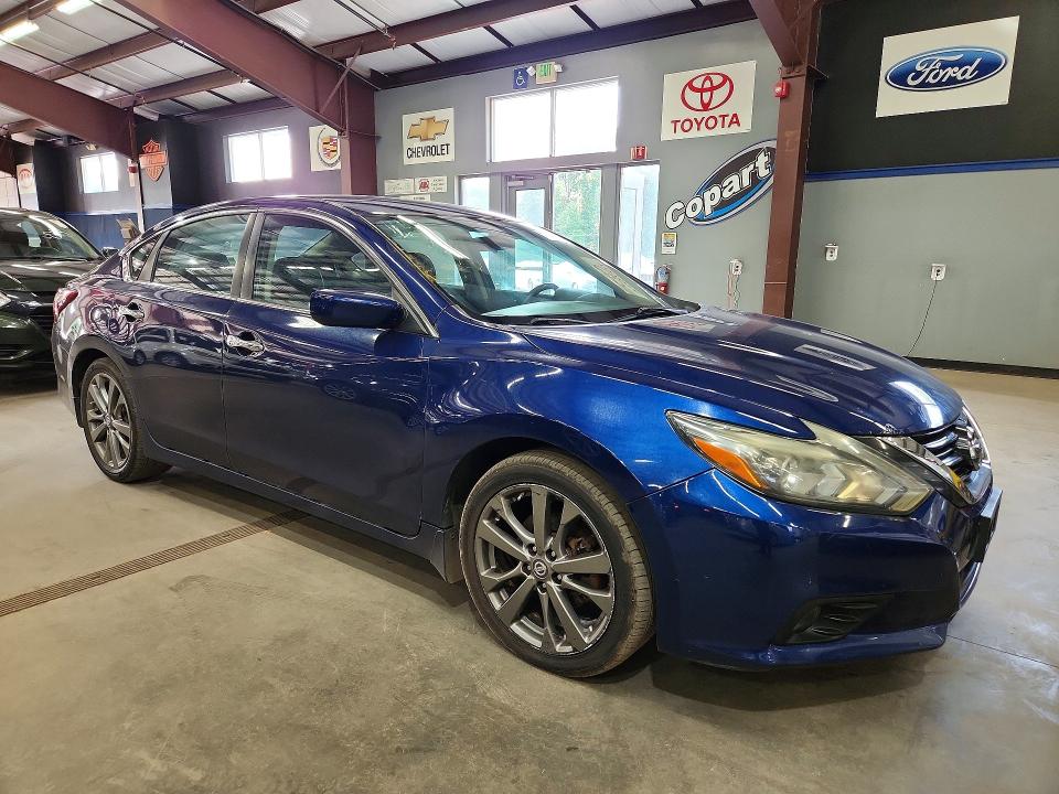 Photo 4 from auction – 2018 NISSAN ALTIMA with VIN 1N4AL3AP8JC156429