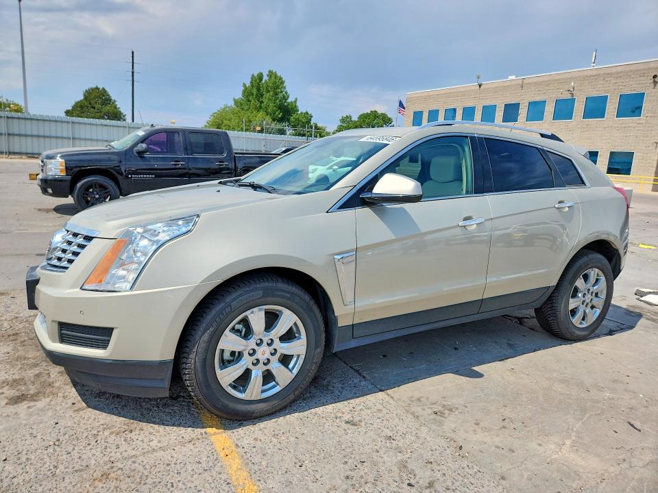 CADILLAC SRX 2015 with VIN 3GYFNEE33FS628206 - Photo from auction