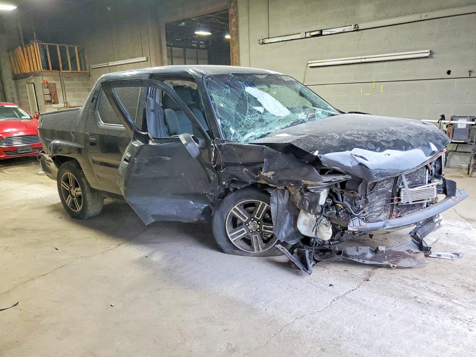 Photo 4 from auction – 2012 HONDA RIDGELINE with VIN 5FPYK1F76CB453866
