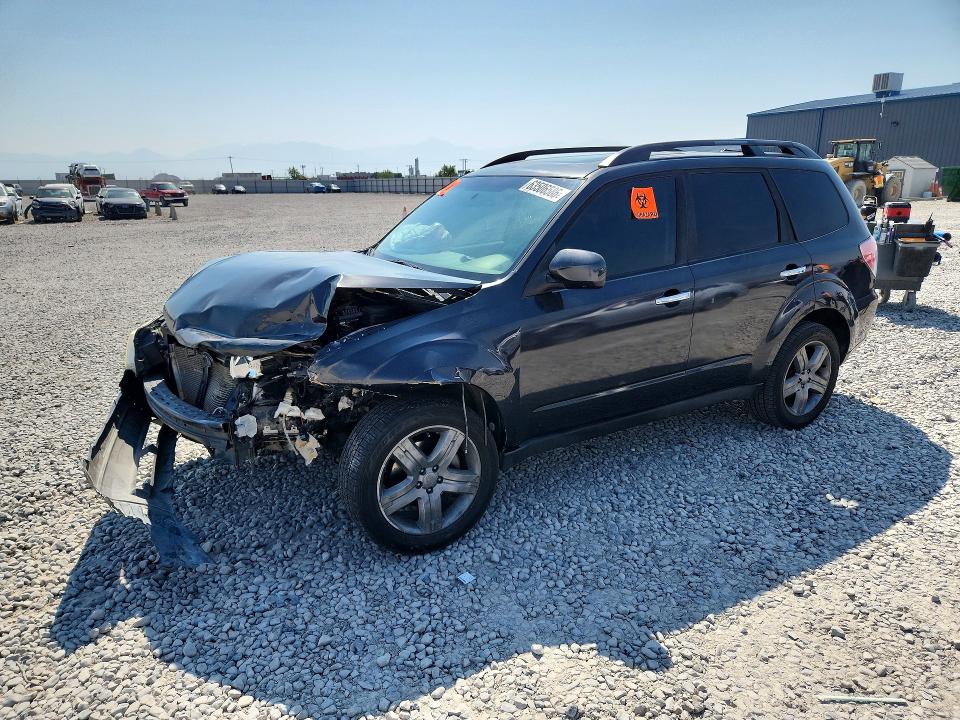 SUBARU FORESTER 2010 with VIN JF2SH6CC8AH797077 - Photo from auction