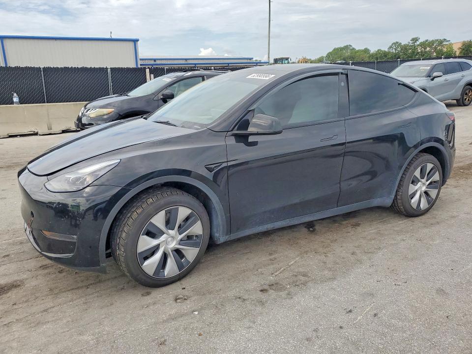 TESLA MODEL Y 2023 with VIN 7SAYGDEE3PF880944 - Photo from auction