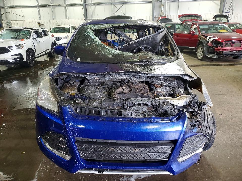Photo 5 from auction – 2015 FORD ESCAPE with VIN 1FMCU9G9XFUA43333