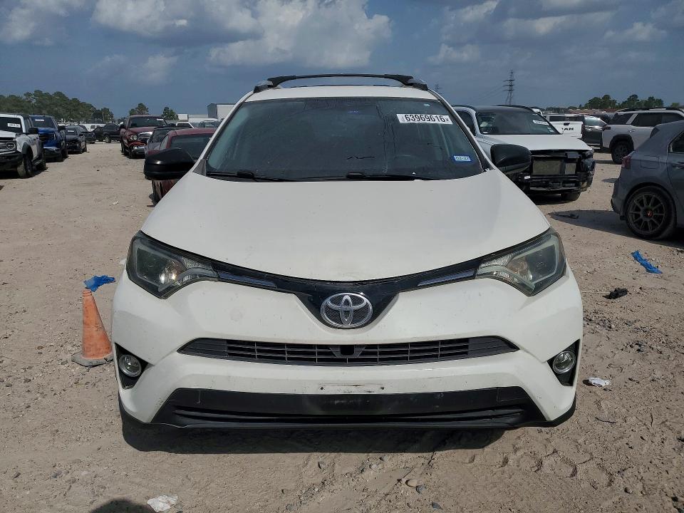Photo 5 from auction – 2016 TOYOTA RAV4 with VIN 2T3ZFREV6GW307211