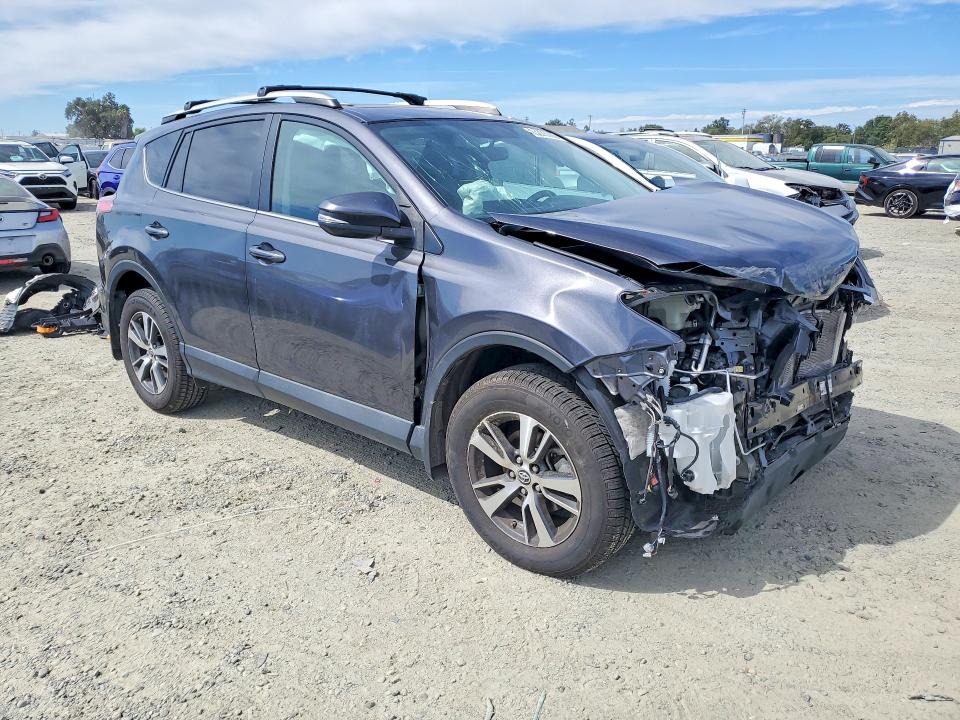 Photo 4 from auction – 2016 TOYOTA RAV4 with VIN 2T3RFREV1GW518171