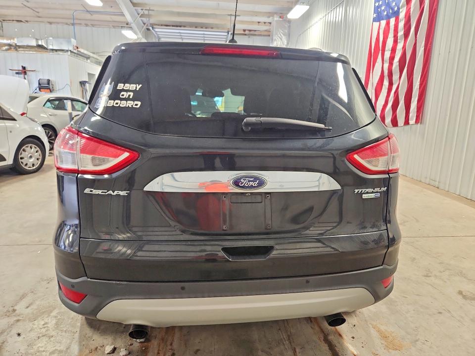 Photo 6 from auction – 2014 FORD ESCAPE with VIN 1FMCU9J91EUD93165