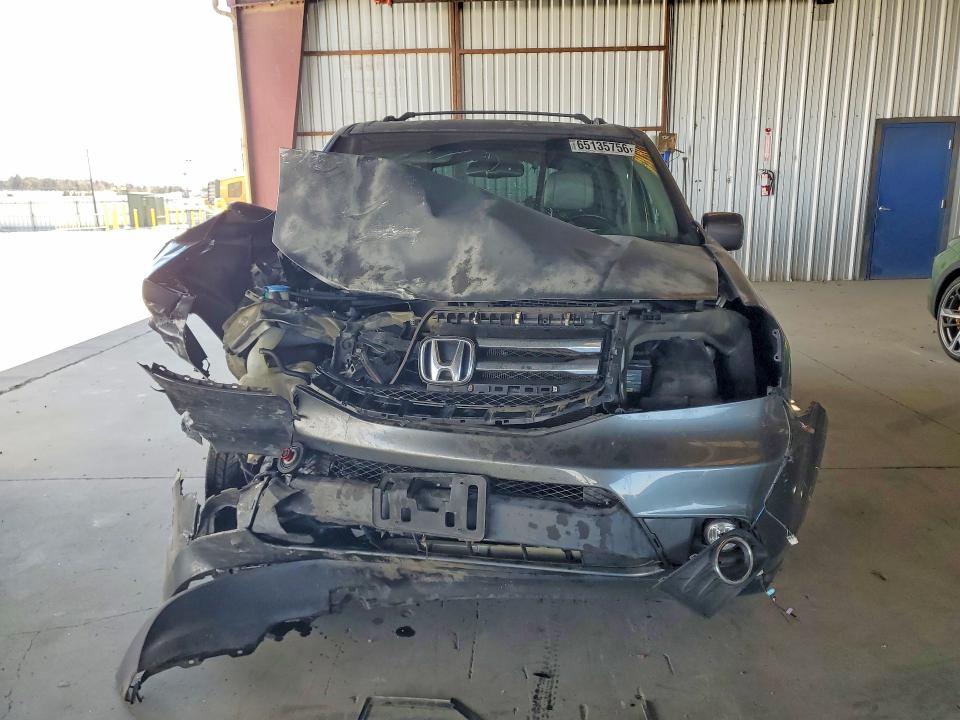 Photo 5 from auction – 2012 HONDA PILOT with VIN 5FNYF4H54CB037065
