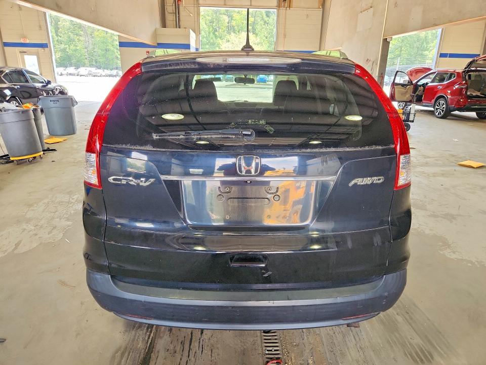 Photo 6 from auction – 2014 HONDA CR-V with VIN 5J6RM4H70EL106419