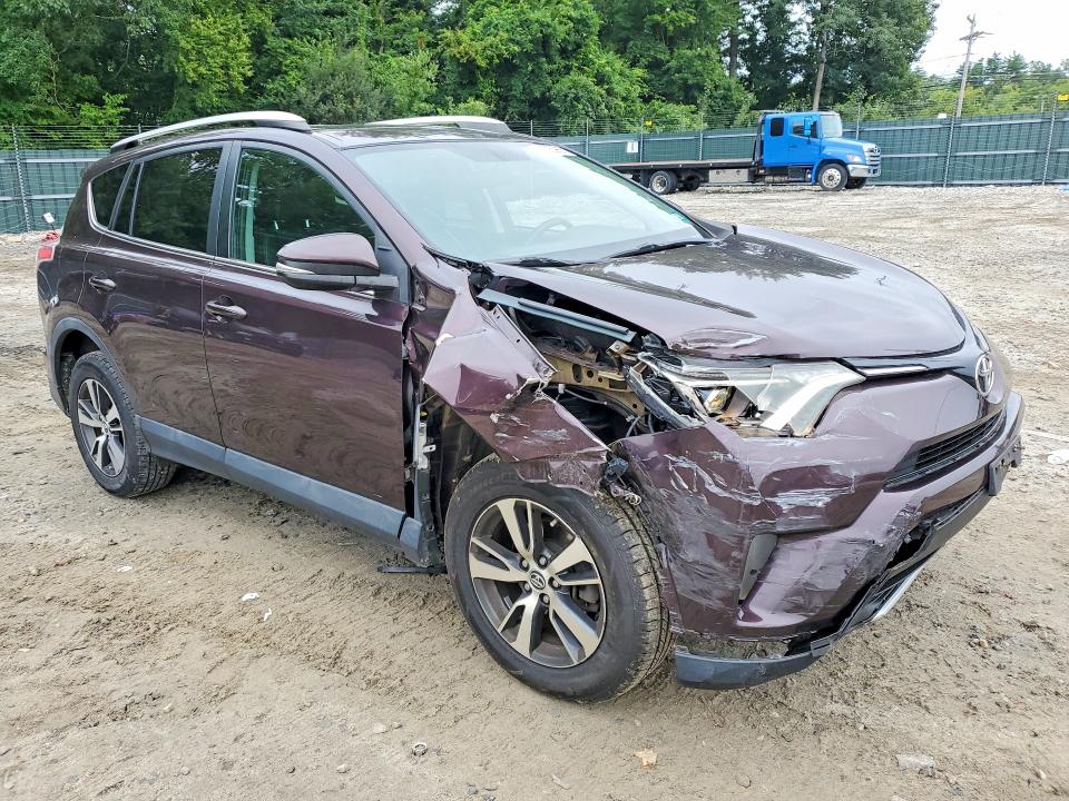 Photo 4 from auction – 2016 TOYOTA RAV4 with VIN 2T3RFREV1GW500852