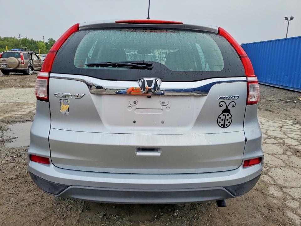 Photo 6 from auction – 2016 HONDA CR-V with VIN 5J6RM4H30GL102029