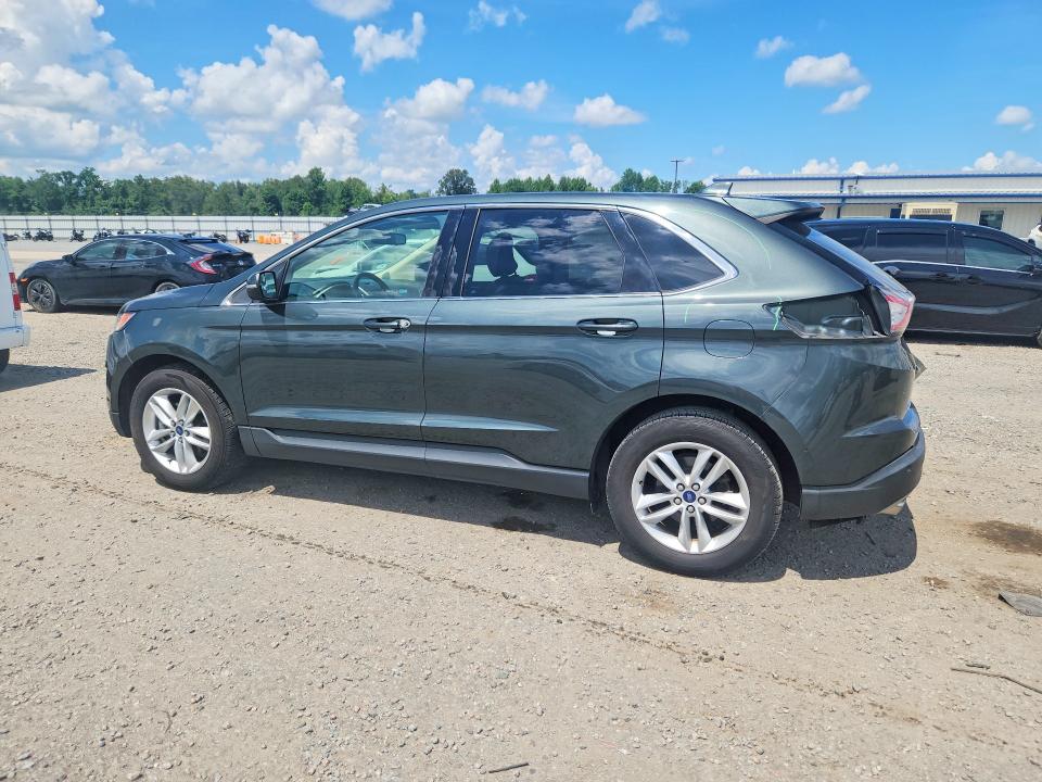 Photo 2 from auction – 2015 FORD EDGE with VIN 2FMTK3J9XFBB40971