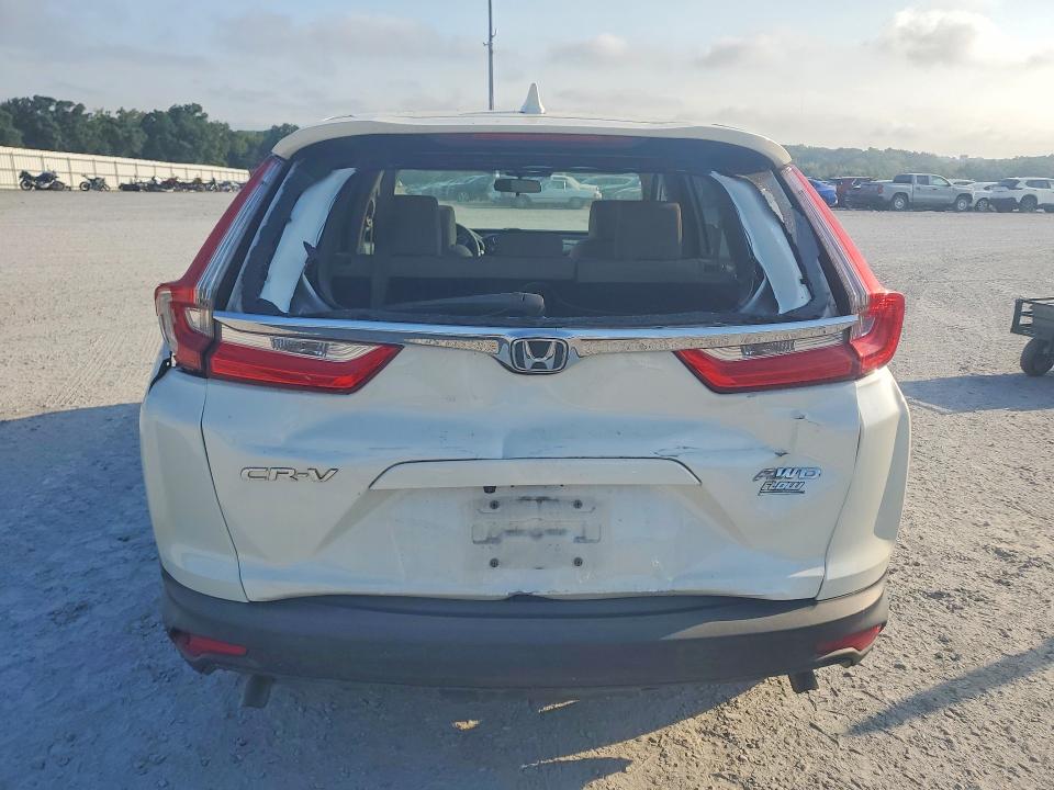 Photo 6 from auction – 2017 HONDA CR-V with VIN 2HKRW2H52HH647032