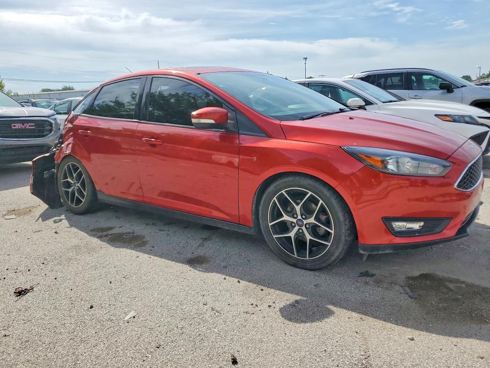 Photo 4 from auction – 2018 FORD FOCUS with VIN 1FADP3H26JL301995