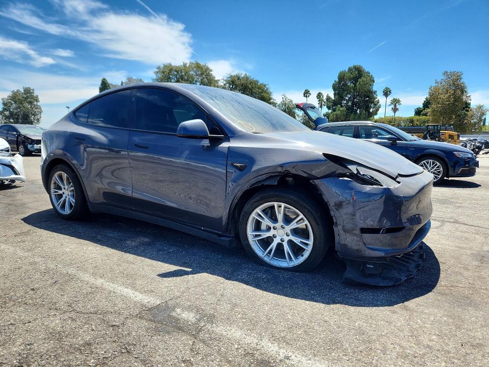 Photo 4 from auction – 2023 TESLA MODEL Y with VIN 7SAYGDEE1PF890369