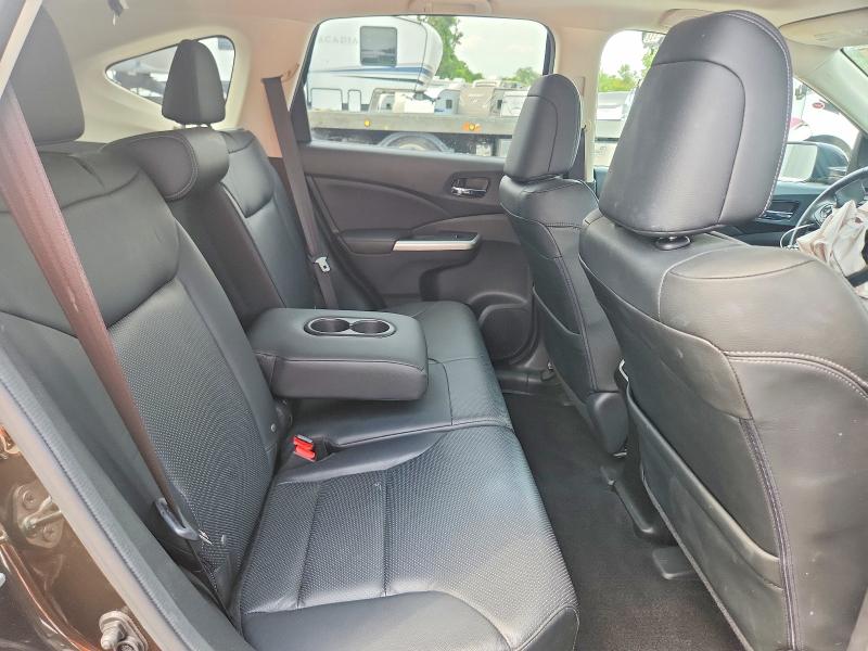 Photo 11 from auction – 2015 HONDA CR-V with VIN 2HKRM4H75FH667663