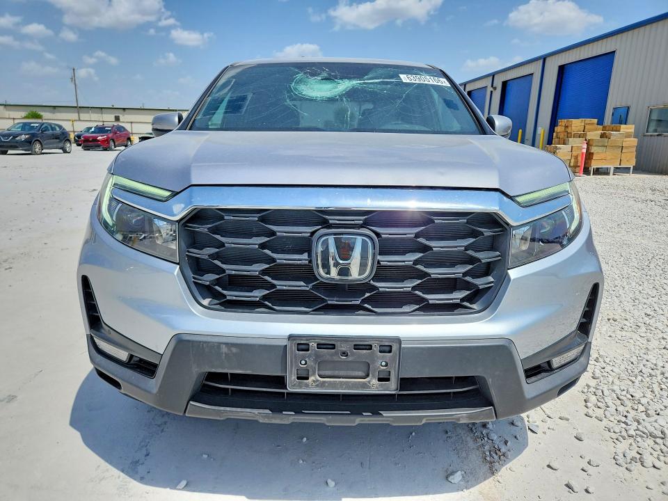 Photo 5 from auction – 2022 HONDA PASSPORT with VIN 5FNYF8H59NB027724