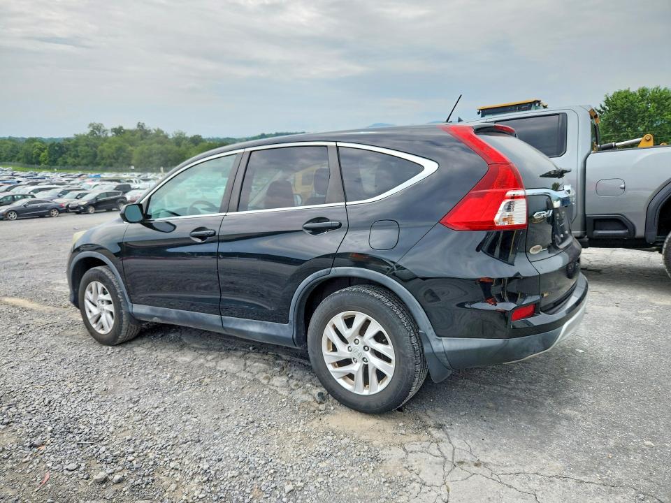 Photo 2 from auction – 2015 HONDA CR-V with VIN 2HKRM4H50FH705301