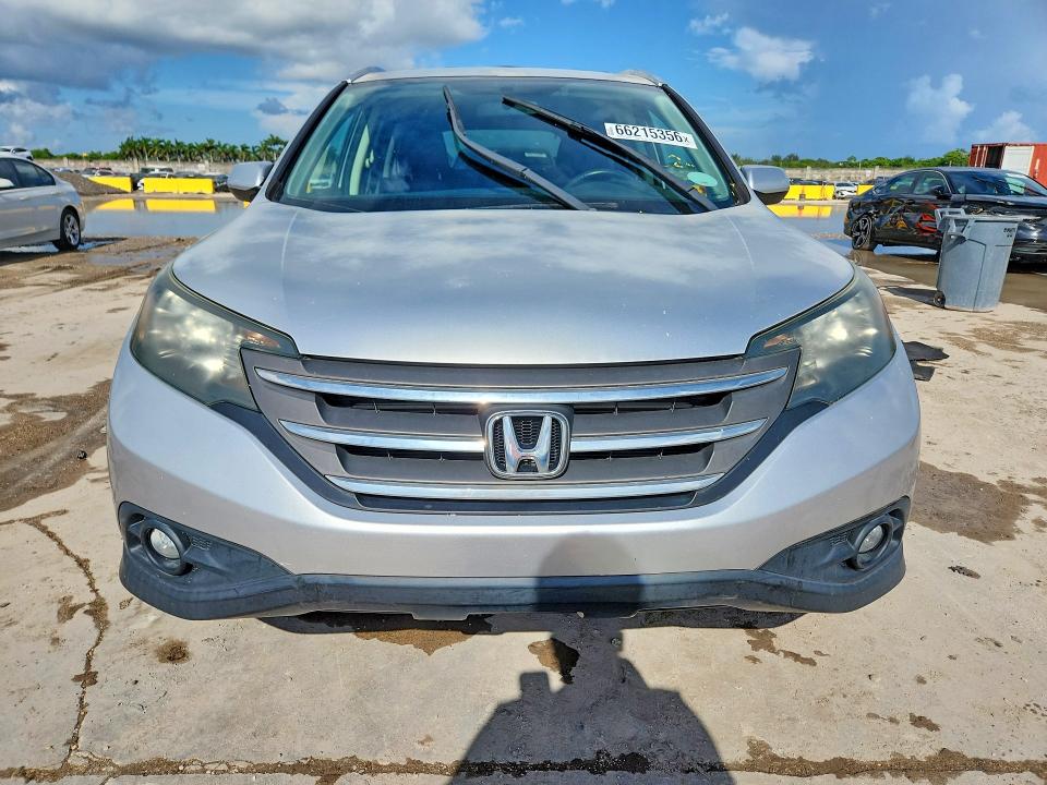 Photo 5 from auction – 2013 HONDA CR-V with VIN 2HKRM4H75DH608352