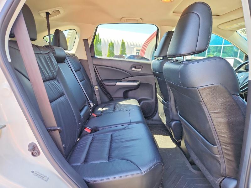 Photo 11 from auction – 2014 HONDA CR-V with VIN 5J6RM4H79EL063621