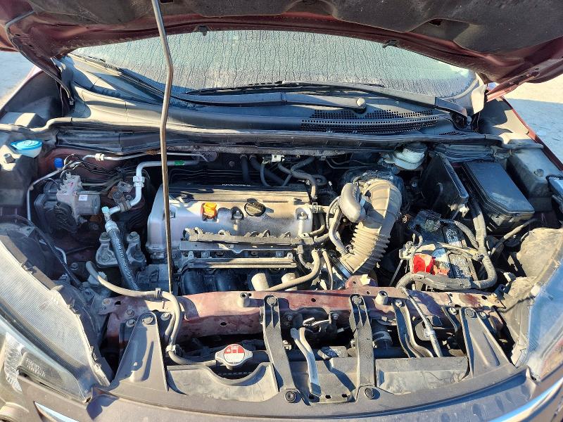 Photo 11 from auction – 2014 HONDA CR-V with VIN 5J6RM4H74EL101076