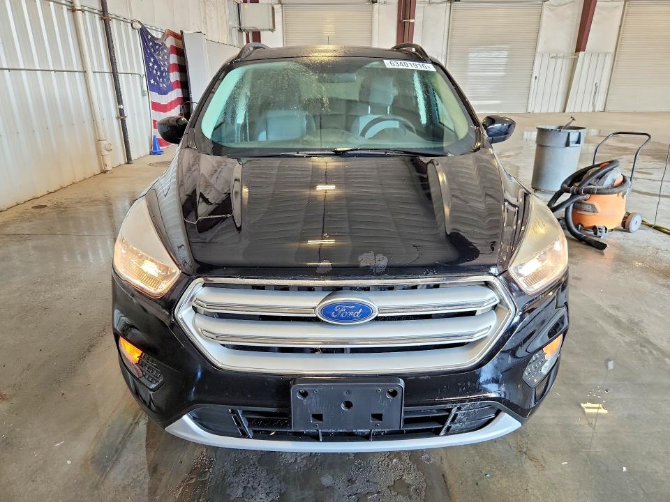 Photo 5 from auction – 2018 FORD ESCAPE with VIN 1FMCU9GD8JUC61607