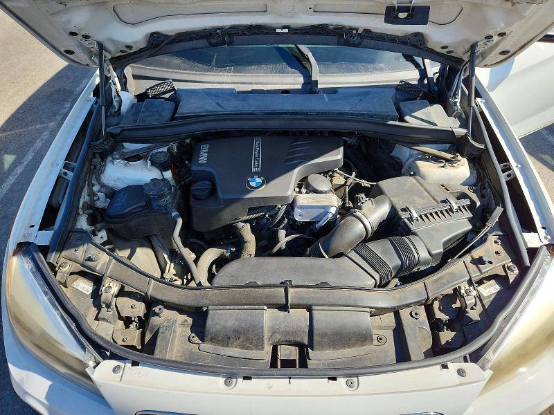 Photo 12 from auction – 2013 BMW X1 with VIN WBAVM1C51DVW46211