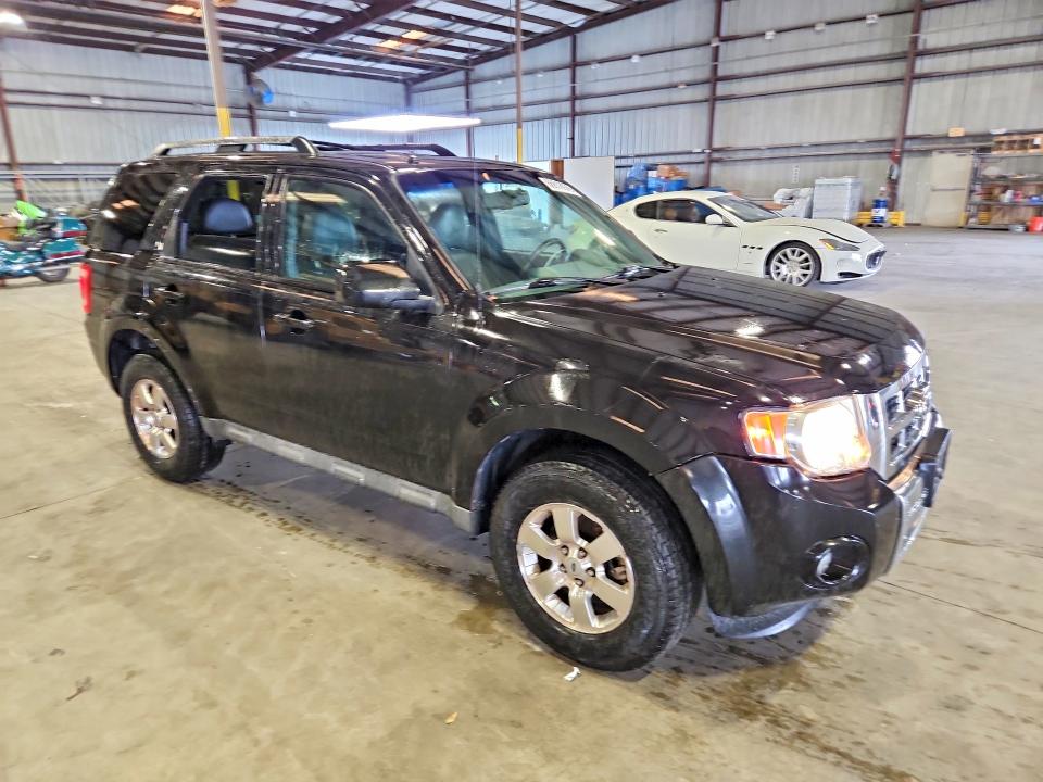Photo 4 from auction – 2011 FORD ESCAPE with VIN 1FMCU0E78BKB38654