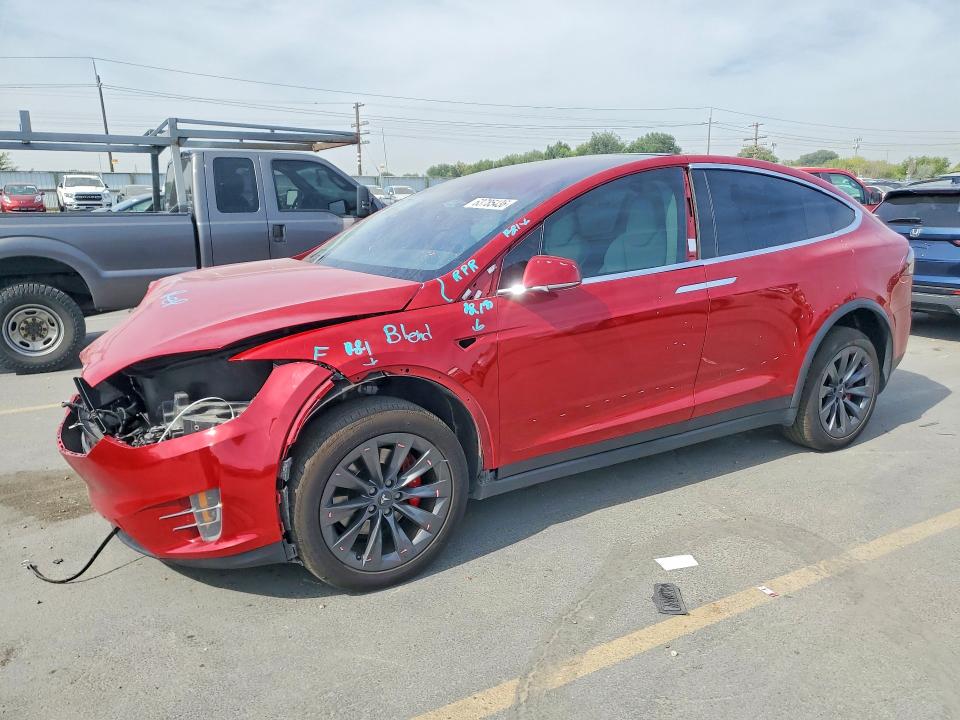 TESLA MODEL X 2018 with VIN 5YJXCBE44JF095534 - Photo from auction