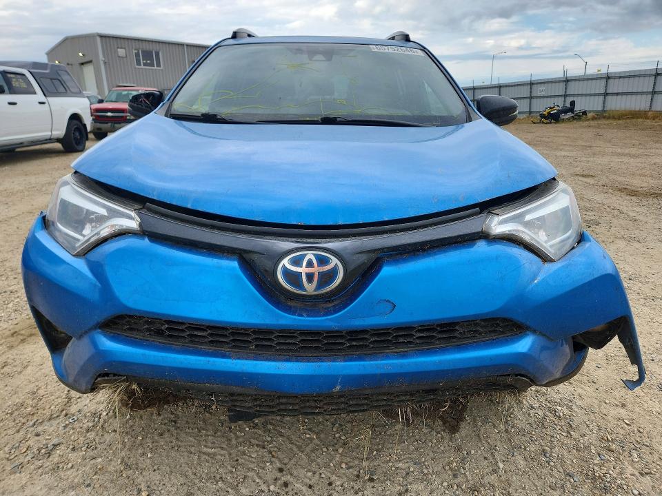 Photo 5 from auction – 2018 TOYOTA RAV4 HV with VIN JTMJJREV7JD219994
