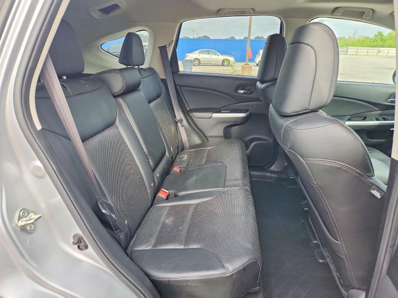 Photo 11 from auction – 2016 HONDA CR-V with VIN 2HKRM4H70GH703325