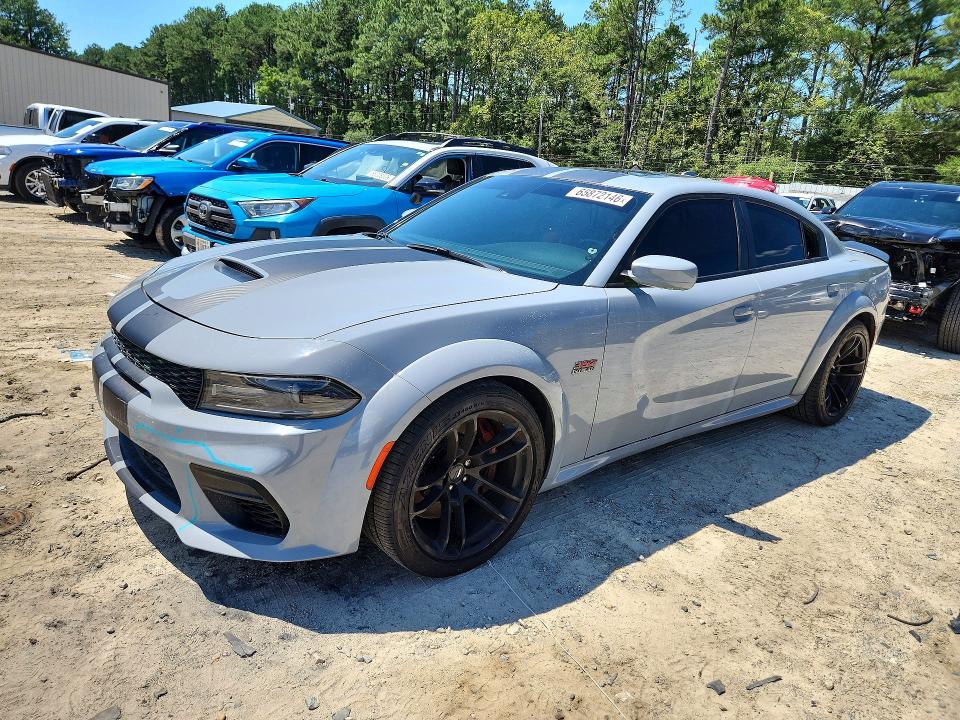 DODGE CHARGER 2021 with VIN 2C3CDXGJ9MH669205 - Photo from auction